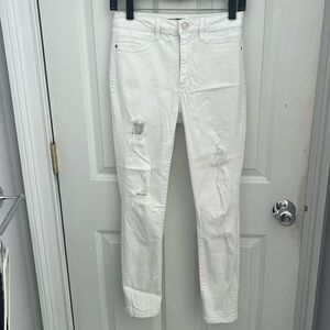 Bebe white distressed skinny jeans size 27 high waisted
